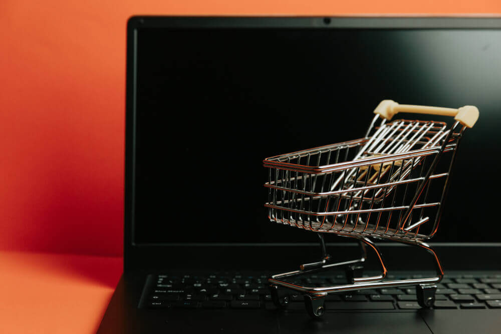 miniature-shopping-cart-on-a-laptop-keyboard.jpg